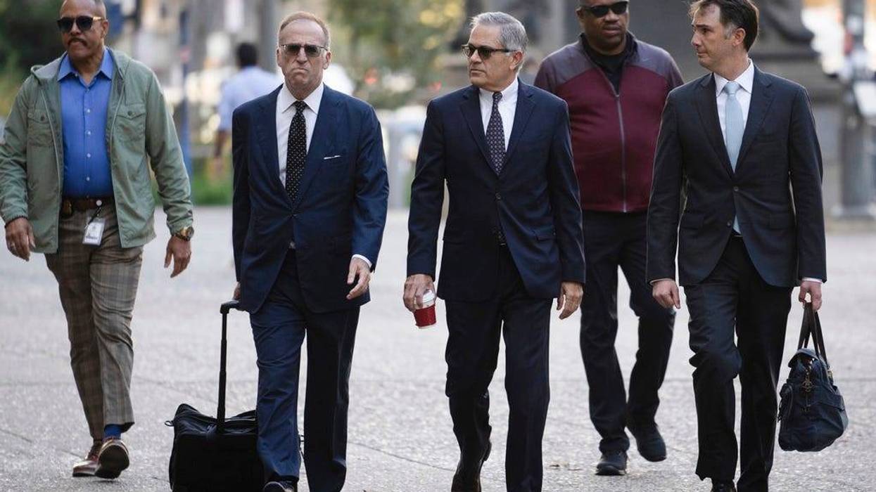 Philadelphia District Attorney Larry Krasner, third from right, arrives for a hearing at a City Hall courtroom, Thursday, Oct. 31, 2024, in Philadelphia.