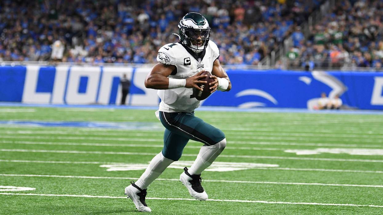 Philadelphia Eagles quarterback Jalen Hurts (1) runs the ball against the Detroit Lions in the first half of an NFL football game in Detroit, Sunday, Sept. 11, 2022.