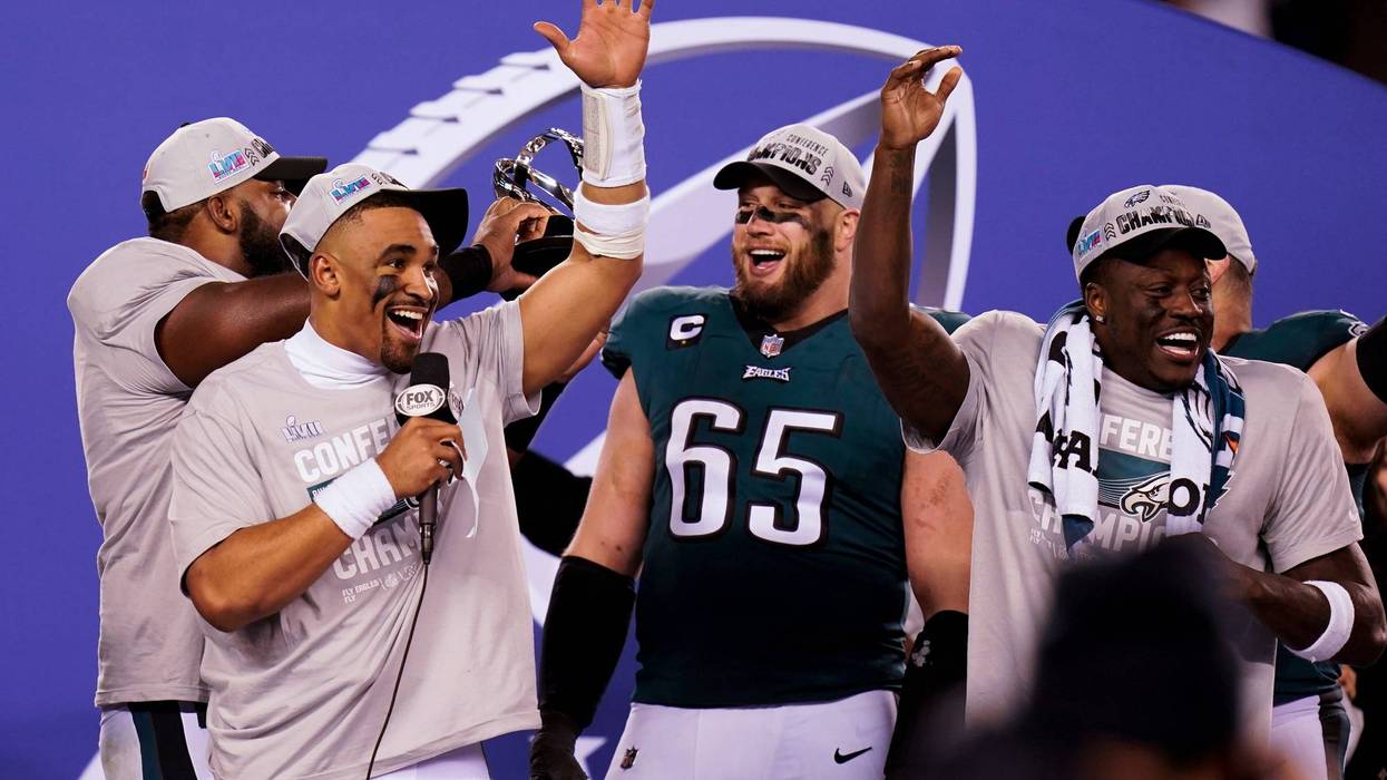 Philadelphia Eagles quarterback Jalen Hurts, left, offensive tackle Lane Johnson (65) and teammates react after the NFC Championship NFL football game between the Philadelphia Eagles and the San Francisco 49ers on Sunday, Jan. 29, 2023, in Philadelphia. The Eagles won 31-7.