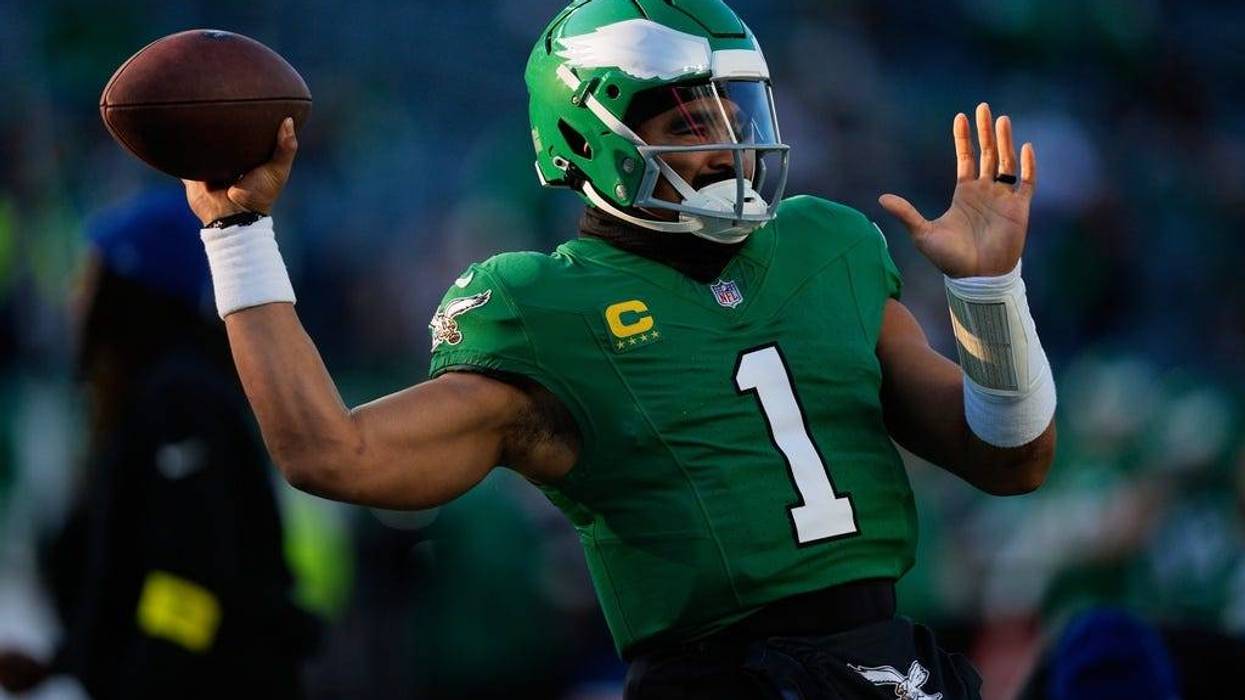 Philadelphia Eagles quarterback Jalen Hurts warms up before an NFL football game against the Washington Commanders on Sunday, Jan. 4, 2026, in Philadelphia.