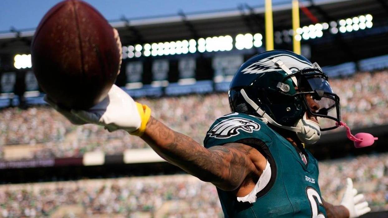 Philadelphia Eagles wide receiver DeVonta Smith celebrates after scoring a touchdown during the second half of an NFL football game against the Cleveland Browns on Sunday, Oct. 13, 2024, in Philadelphia.