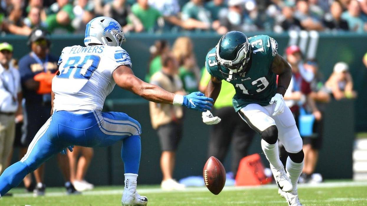 Philadelphia Eagles wide receiver Nelson Agholor (13) fumbles the football during the second quarter against the Detroit Lions at Lincoln Financial Field.