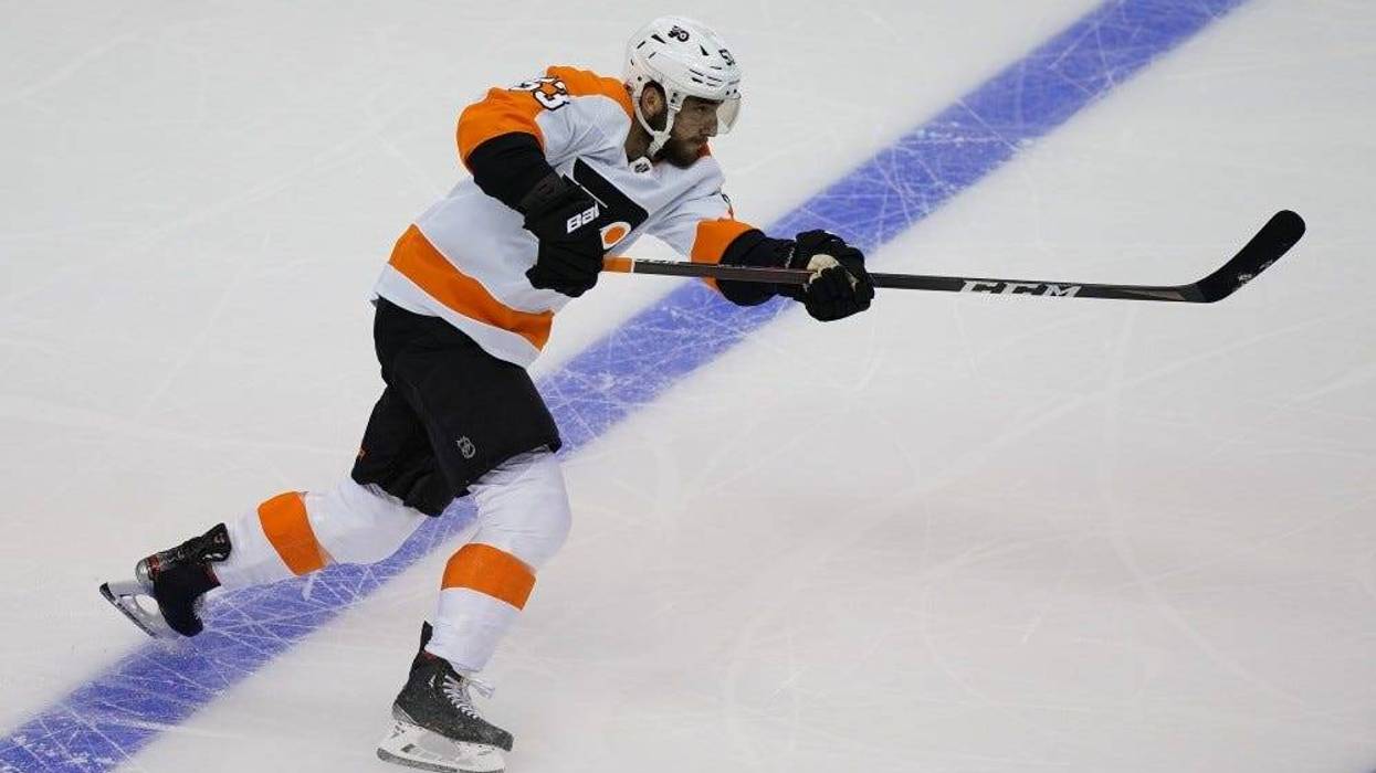 Philadelphia Flyers defenseman Shayne Gostisbehere (53) shoots a puck