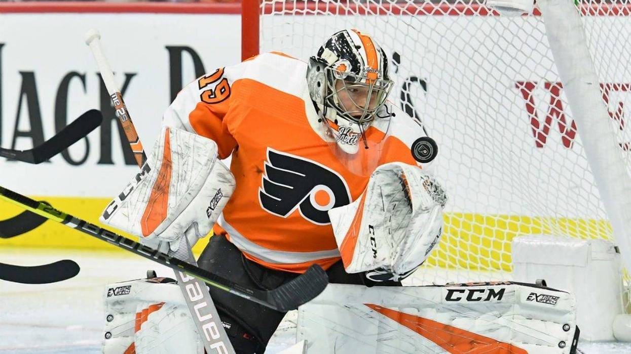 Philadelphia Flyers goaltender Carter Hart (79) makes a save against the Vancouver Canucks during the first period at Wells Fargo Center.