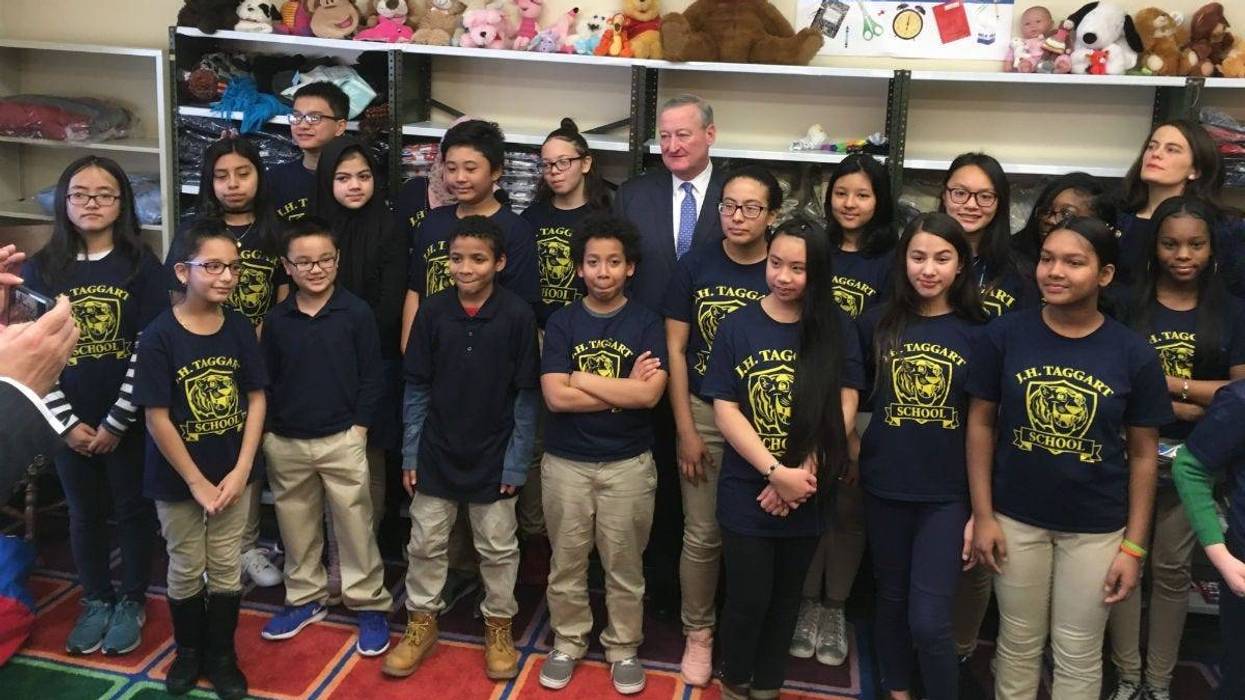 Philadelphia Mayor Jim Kenney and Pa. Rep. Elizabeth Fiedler stand with students from, Taggart elementary School in South Philly.