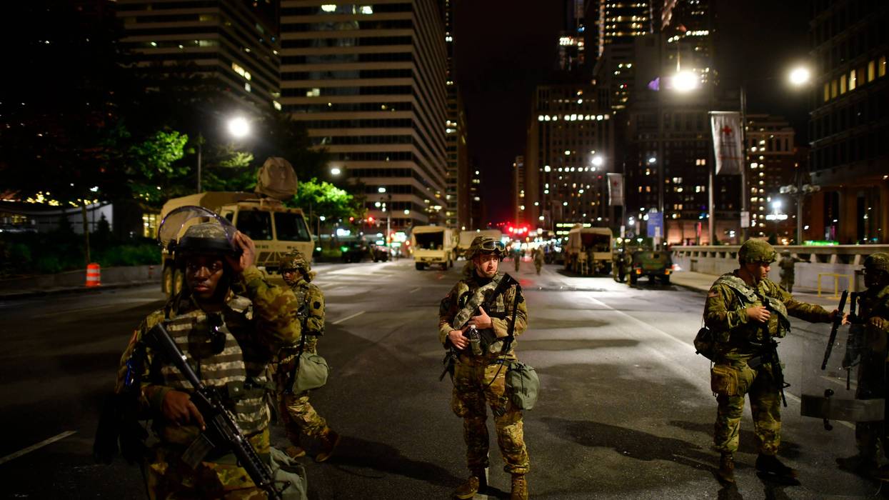 PHILADELPHIA, PA - JUNE 03: Members of the Pennsylvania National Guard monitor activity outside City Hall in the aftermath of widespread looting for the past five days on June 3, 2020 in Philadelphia, Pennsylvania. Demonstrations have erupted all across the country in response to George Floyd's death in Minneapolis, Minnesota while in police custody on May 25.