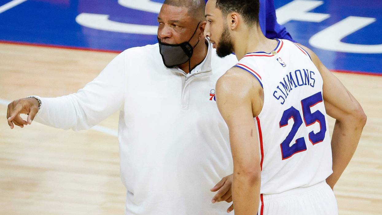 PHILADELPHIA, PENNSYLVANIA - APRIL 28: Head coach Doc Rivers of the Philadelphia 76ers speaks with Ben Simmons #25 during the first quarter against the Atlanta Hawks at Wells Fargo Center on April 28, 2021 in Philadelphia, Pennsylvania.