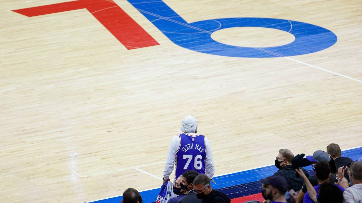 PHILADELPHIA, PENNSYLVANIA - MAY 23: A fan looks on during the fourth quarter between the Philadelphia 76ers and the Washington Wizards during Game One of the Eastern Conference first round series at Wells Fargo Center on May 23, 2021 in Philadelphia, Pennsylvania.