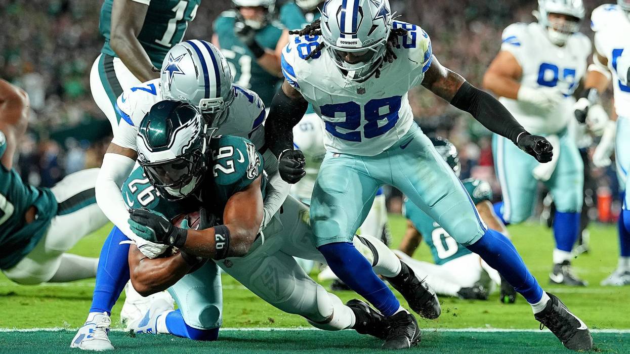 PHILADELPHIA, PENNSYLVANIA - SEPTEMBER 04: Saquon Barkley #26 of the Philadelphia Eagles scores a 10 yard touchdown against the Dallas Cowboys during the second quarter in the game at Lincoln Financial Field on September 04, 2025 in Philadelphia, Pennsylvania. (Photo by Mitchell Leff/Getty Images)