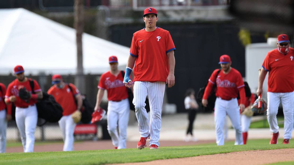 Philadelphia Phillies catcher J.T. Realmuto (10) walks towards the batting cage during spring training at Spectrum Field.