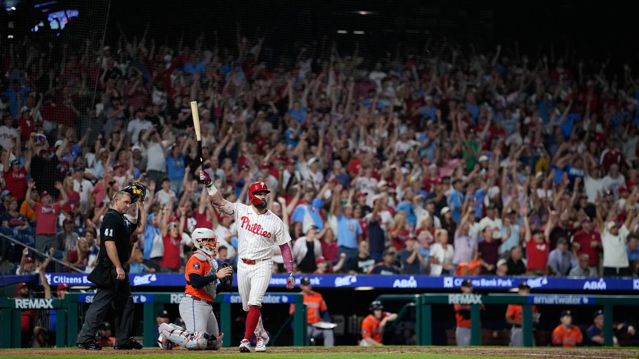 Schwarber hits grand slam for 44th homer in Phillies' 11-7 win over Astros