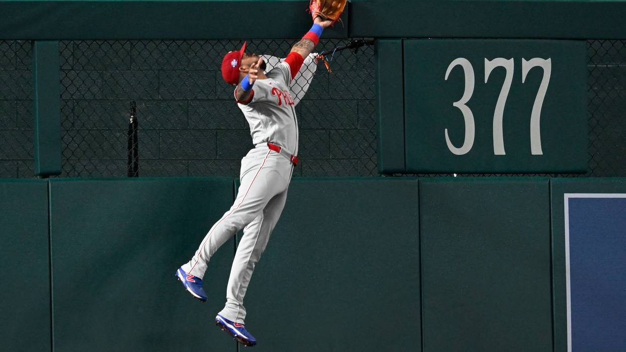 Phillies score 8 runs in the ninth inning and rally past the Nationals 14-9