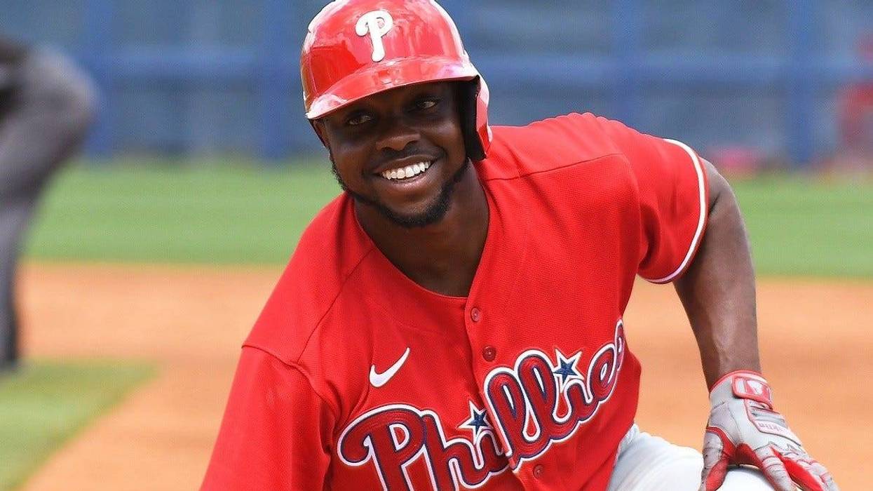 Philadelphia Phillies outfielder Roman Quinn (24) smiles after a pick off attempt in the third inning against the Tampa Bay Rays at Charlotte Sports Park.