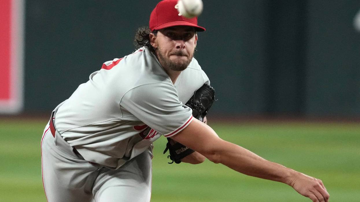Philadelphia Phillies pitcher Aaron Nola throws against the Arizona Diamondbacks in the first inning of a baseball game, Saturday, Sept. 20, 2025, in Phoenix.