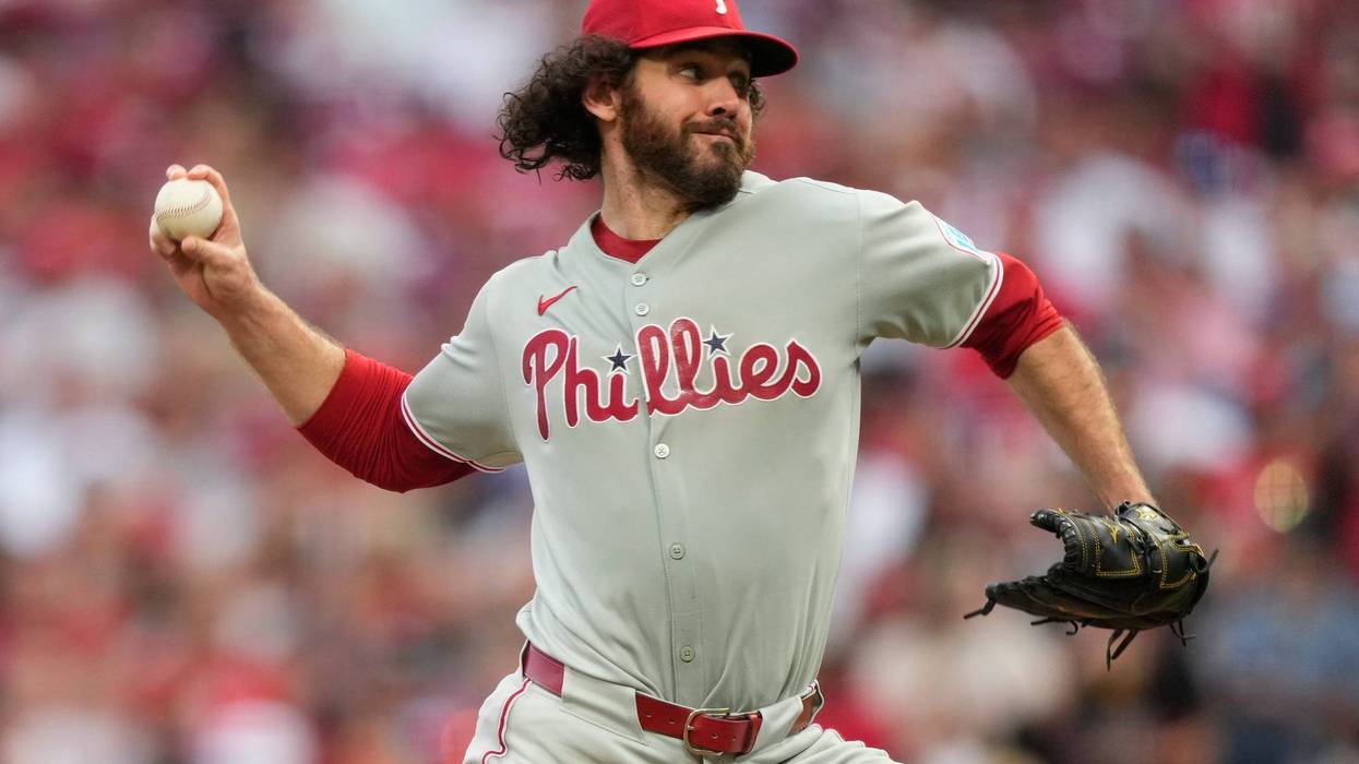 Philadelphia Phillies pitcher Jordan Romano throws during the seventh inning of a baseball game against the Cincinnati Reds on Aug. 11, 2025, in Cincinnati.