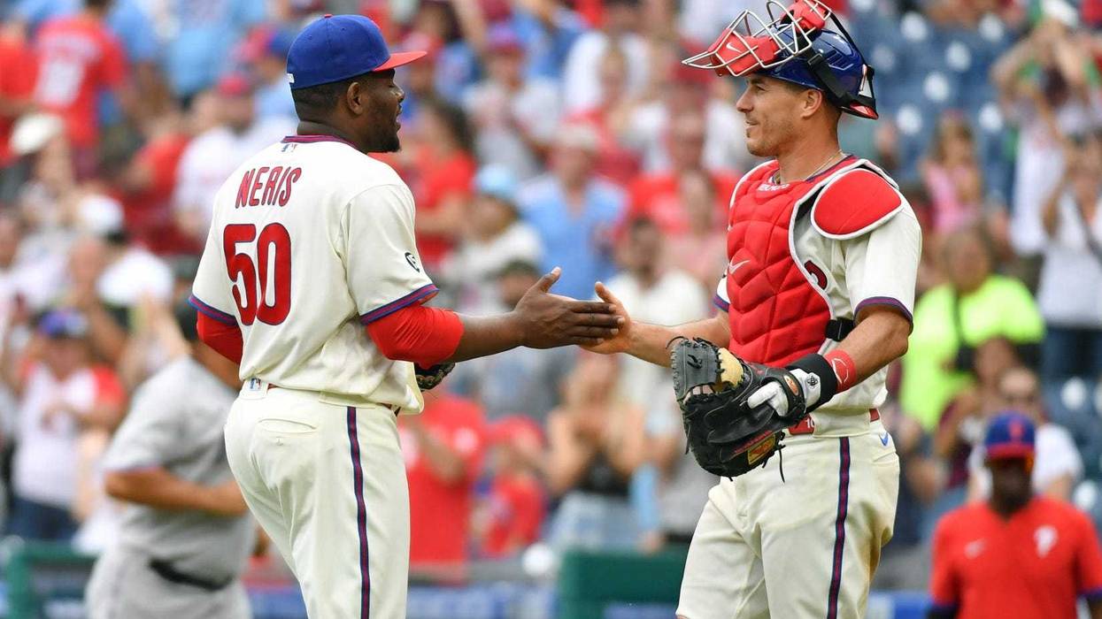 Philadelphia Phillies relief pitcher Hector Neris and Philadelphia Phillies catcher J.T. Realmuto