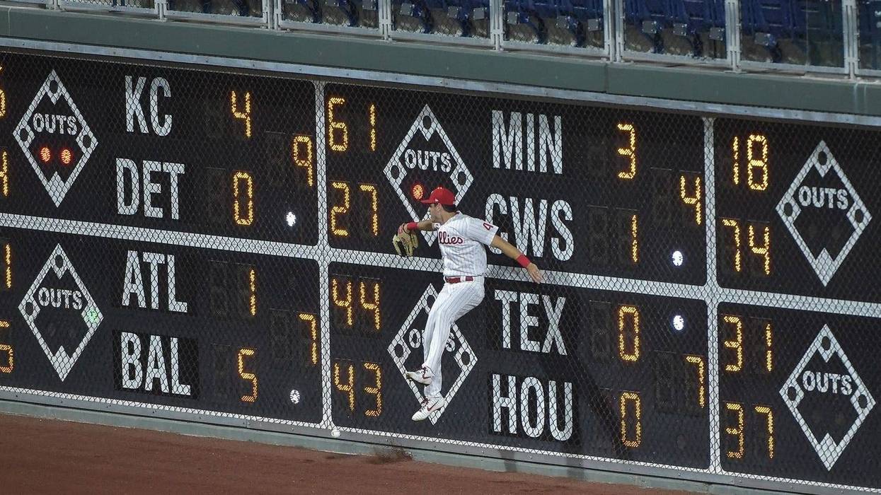 Philadelphia Phillies right fielder Adam Haseley (40) is unable to catch the ball hit by New York Mets designated hitter J.D. Davis (28) during the eighth inning of the game at Citizens Bank Park. The Mets won the game 5-4.