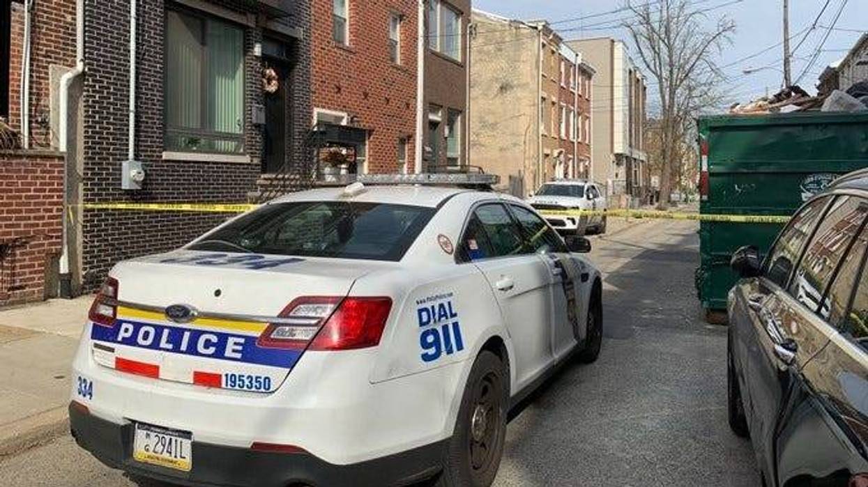 Philadelphia police officers found the body of a young man in an empty lot on Manton Street near the intersection of 4th and Federal streets.