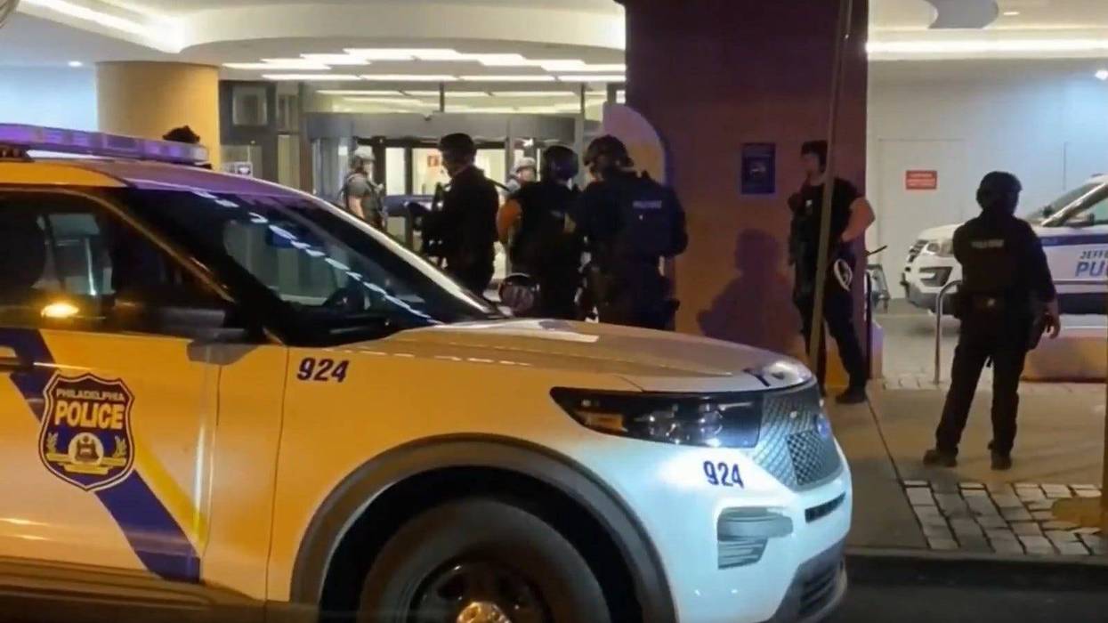 Philadelphia Police officers outside of Thomas Jefferson Hospital in Center City. The suspect in this case allegedly shot and wounded officer Arcenio Perez, who was honored by the Fraternal Order of Police Lodge No. 5 on Wednesday.