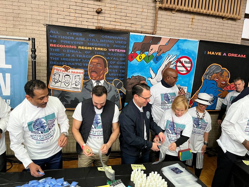 Philadelphia schools Superintendent Tony Watlington and Pennsylvania Gov. Josh Shapiro joined volunteers at Girard College.