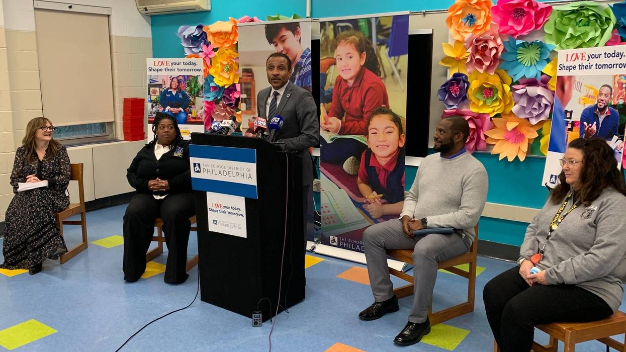 Philadelphia Schools Superintendent Tony Watlington (center) speaks at a news conference on early teacher recruitment at Bethune Elementary School on Tuesday.