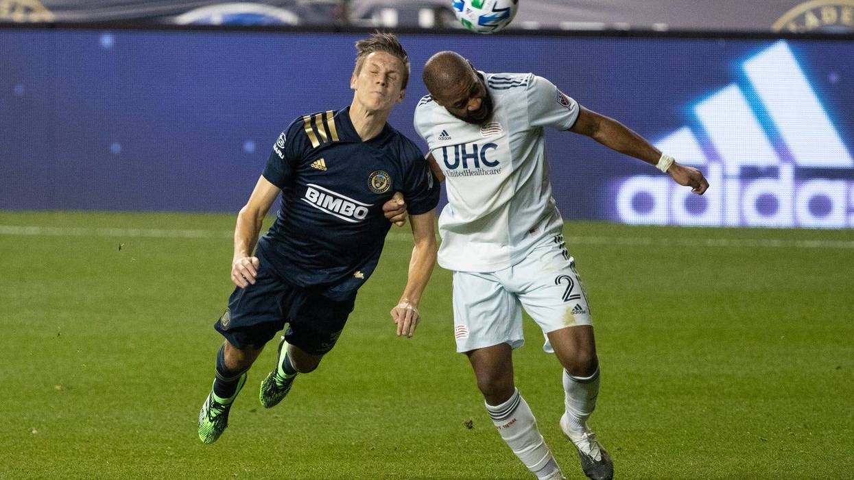 Philadelphia Union defender Jack Elliott (3) heads the ball against New England Revolution defender Andrew Farrell (2) during the second half at Subaru Park.
