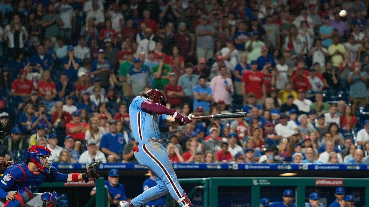 Phillies outfielder Bryce Harper hits a walk-off grand slam against the Cubs.