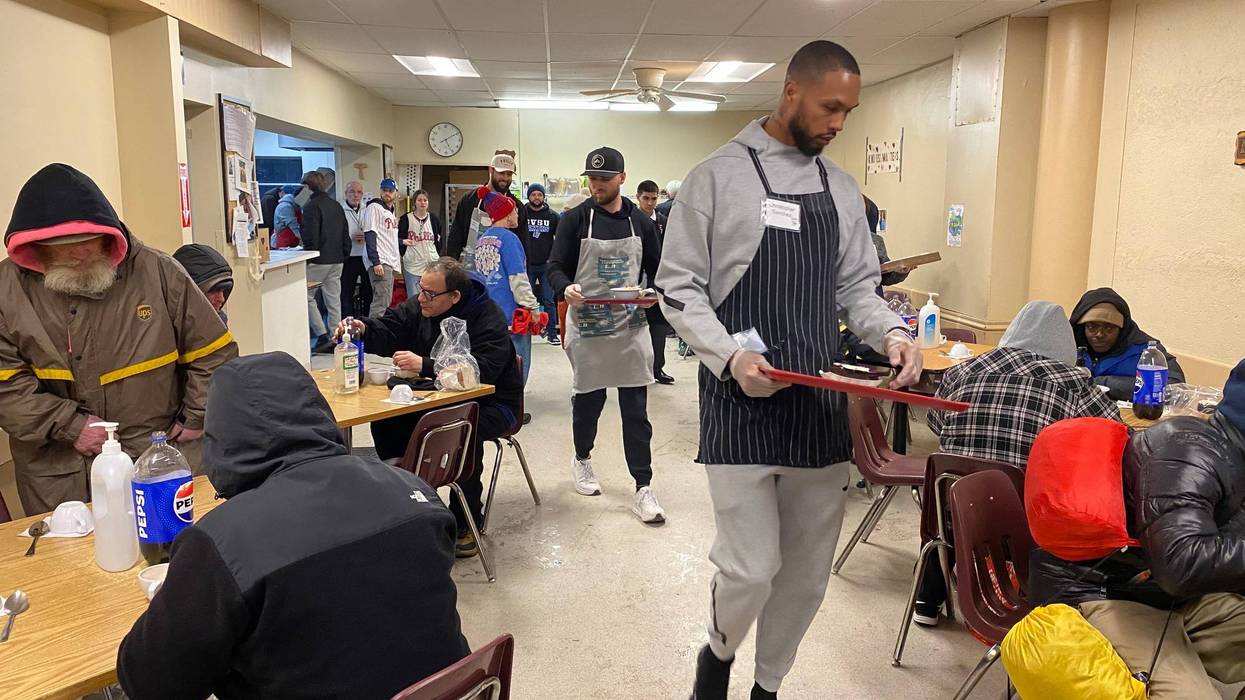 Phillies player Cristopher Sanchez serves meals to people in need at St. Francis Inn in Kensington on Jan. 22, 2025.