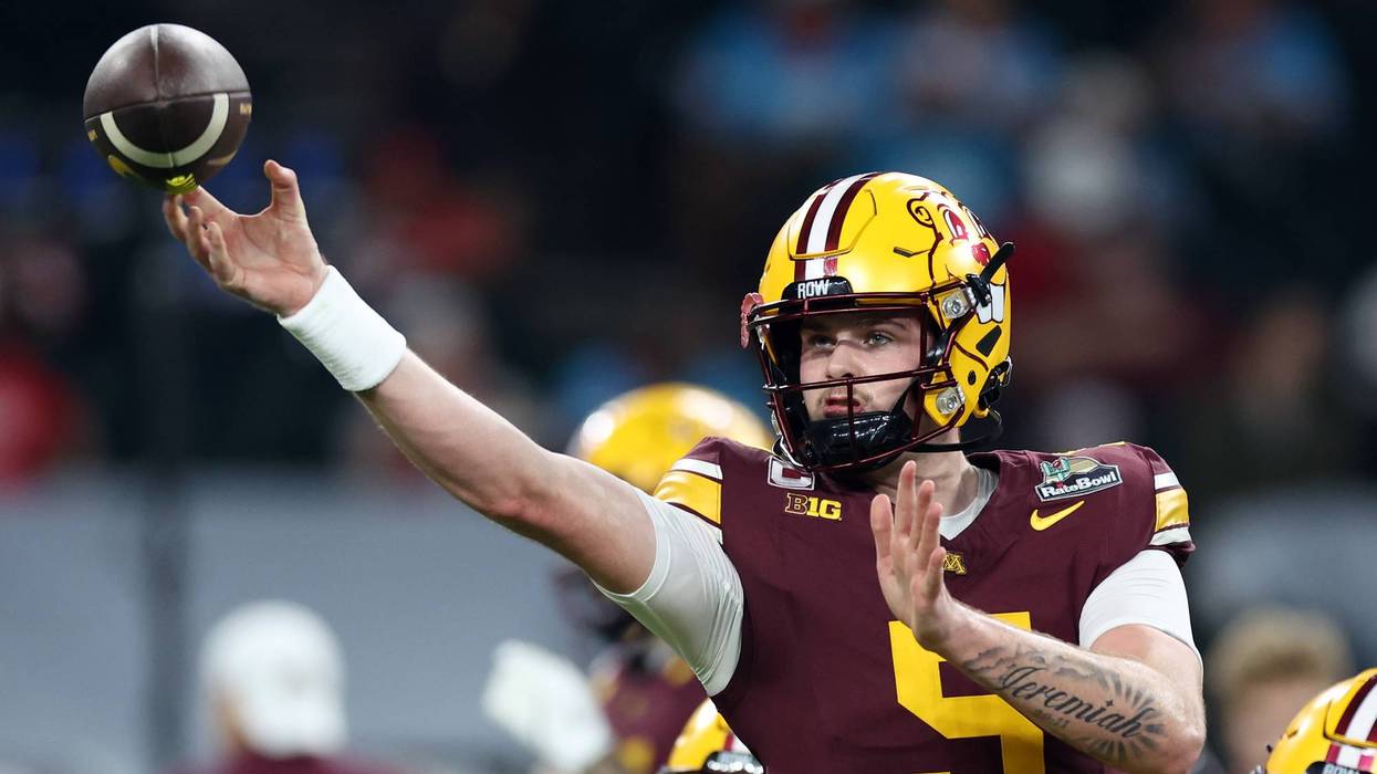 PHOENIX, ARIZONA - DECEMBER 26: Drake Lindsey #5 of the Minnesota Golden Gophers warms up before the 2025 Rate Bowl against the New Mexico Lobos at Chase Field on December 26, 2025 in Phoenix, Arizona.