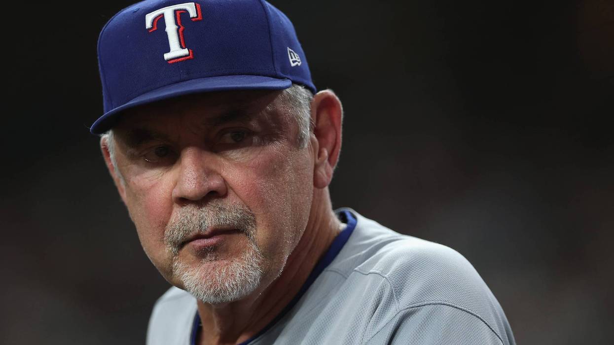 PHOENIX, ARIZONA - SEPTEMBER 01: Manager Bruce Bochy #15 of the Texas Rangers watches from the dugout during the MLB game against the Arizona Diamondbacks at Chase Field on September 01, 2025 in Phoenix, Arizona. (Photo by Christian Petersen/Getty Images)