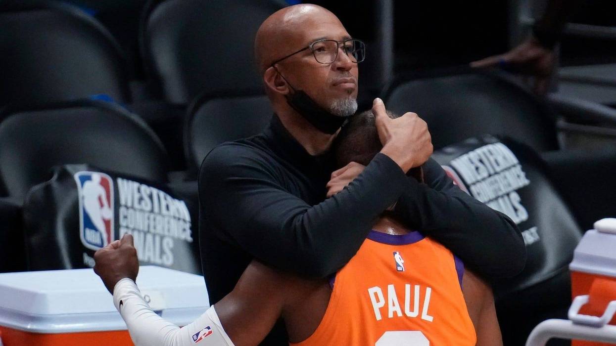 Phoenix Suns head coach Monty Williams hugs guard Chris Paul