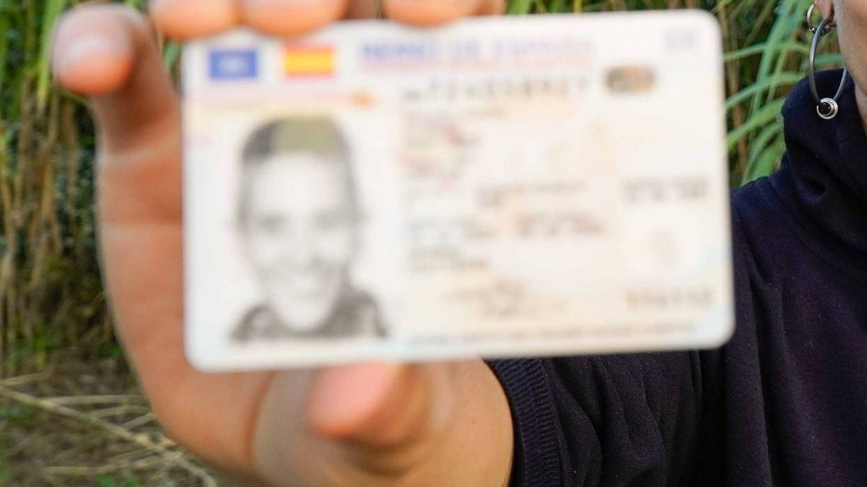 photo ID being held up