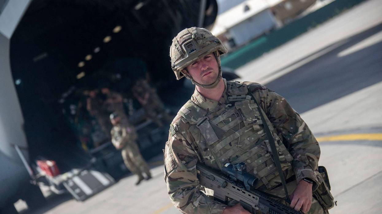 Photo issued on Saturday Aug. 28, 2021 by Britain's Ministry of Defence (MoD) showing UK military personnel boarding a A400M aircraft departing Kabul, Afghanistan. Britain ended its evacuation flights Saturday, though Prime Minister Boris Johnson promised to “shift heaven and earth” to get more of those at risk from the Taliban to Britain by other means. Britain’s ambassador to Afghanistan, Laurie Bristow, said in a video from Kabul airport and posted on Twitter that it was “time to close this phase of the operation now.” (Jonathan Gifford/MoD via AP)
