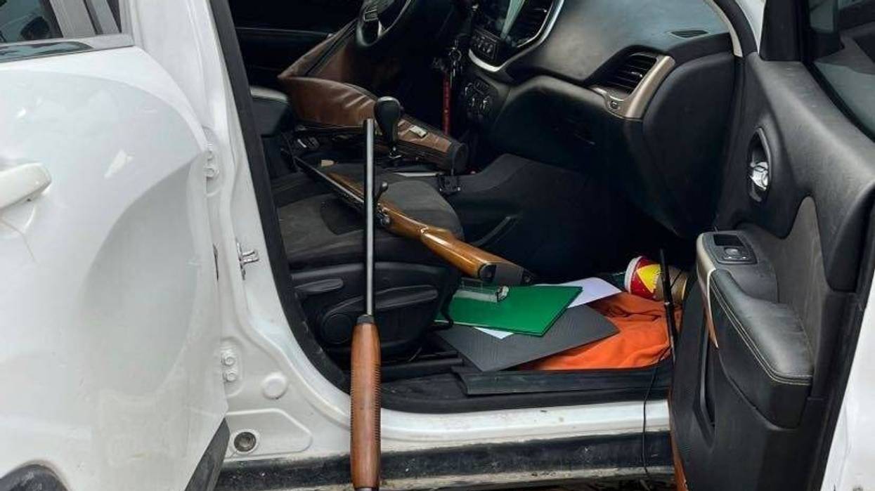 Photo of guns and vehicle