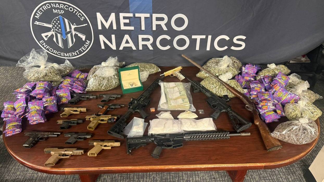 Photo of narcotics, guns and money seized in operation