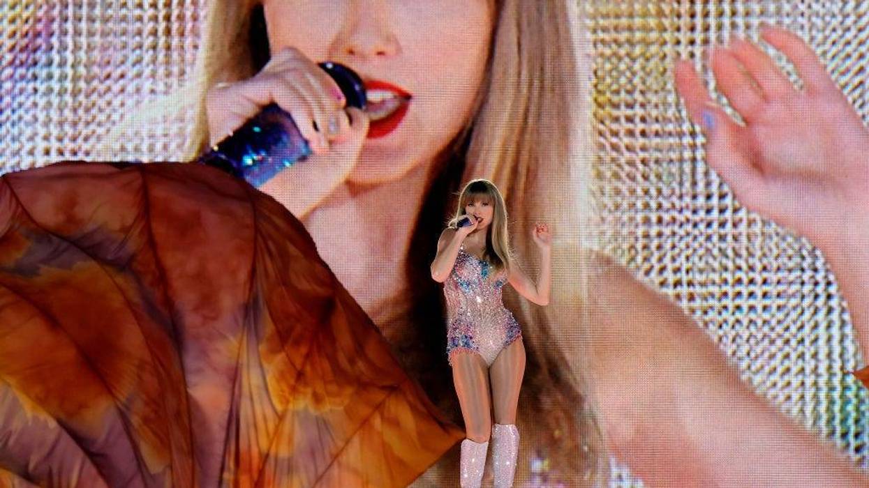 Photo of Taylor Swift performing on her Eras Tour