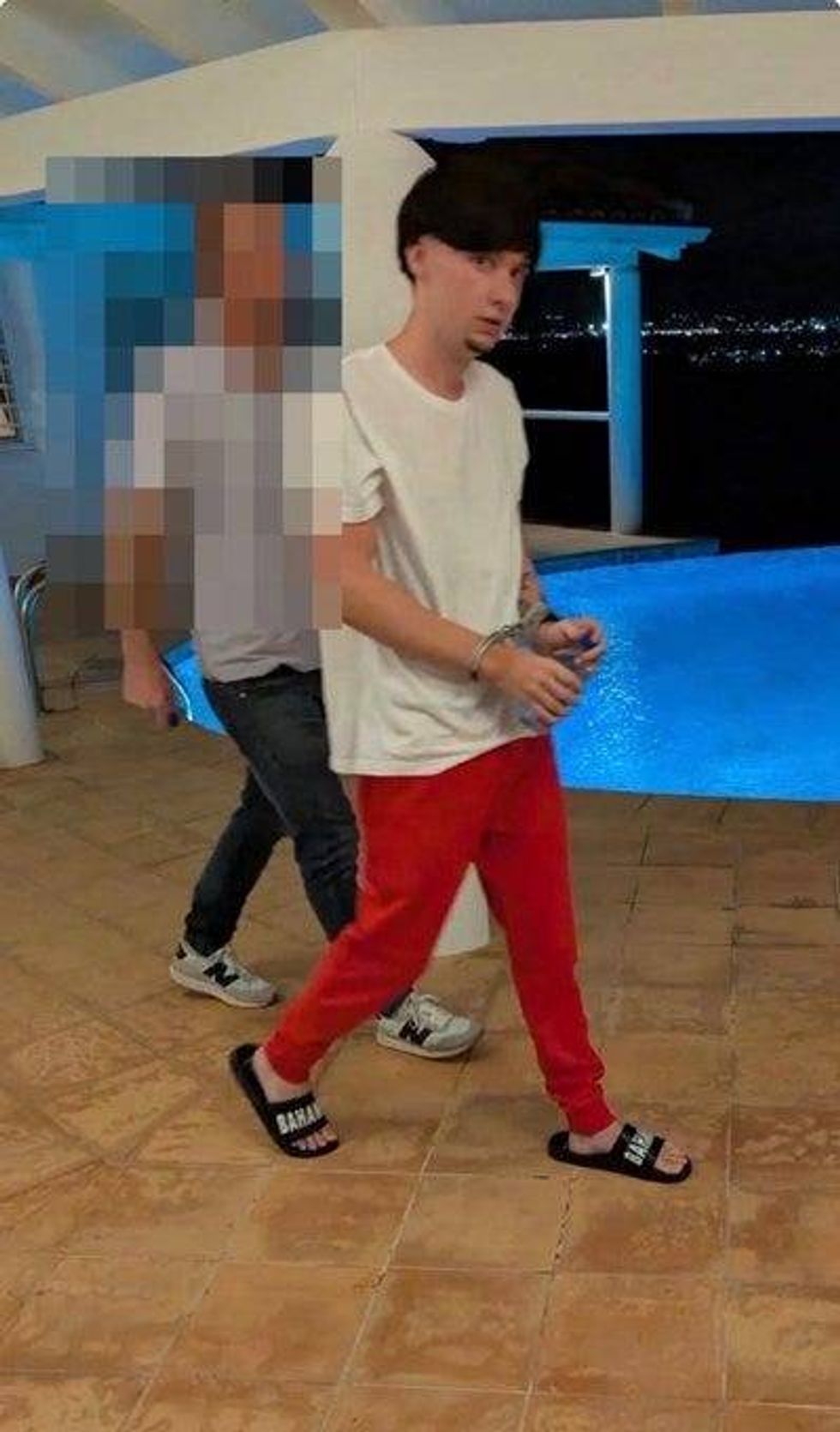 Photo shared regarding apprehension of John Daghita in Saint Martin.