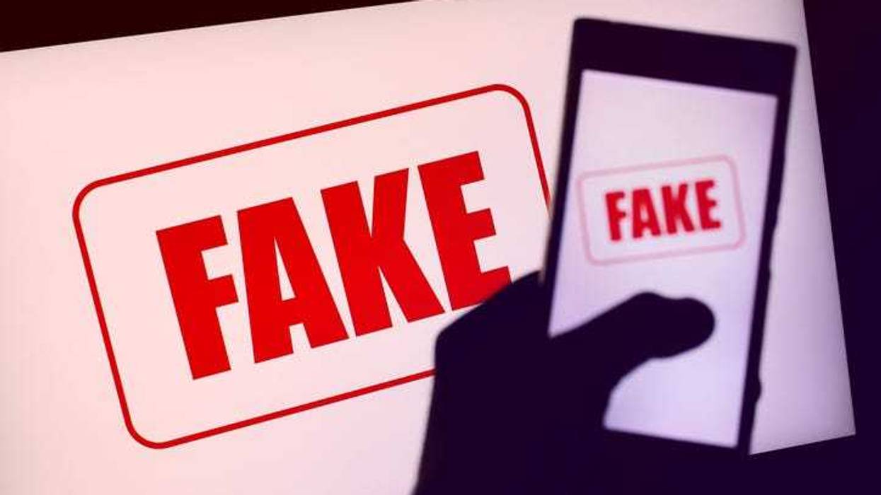 Photografies of fake news both on smartphones to computers on the internet. The word fake appears on both screens. This concept symbolice the common platform where the news appears and as a result the same information and in consequence the same fake news.