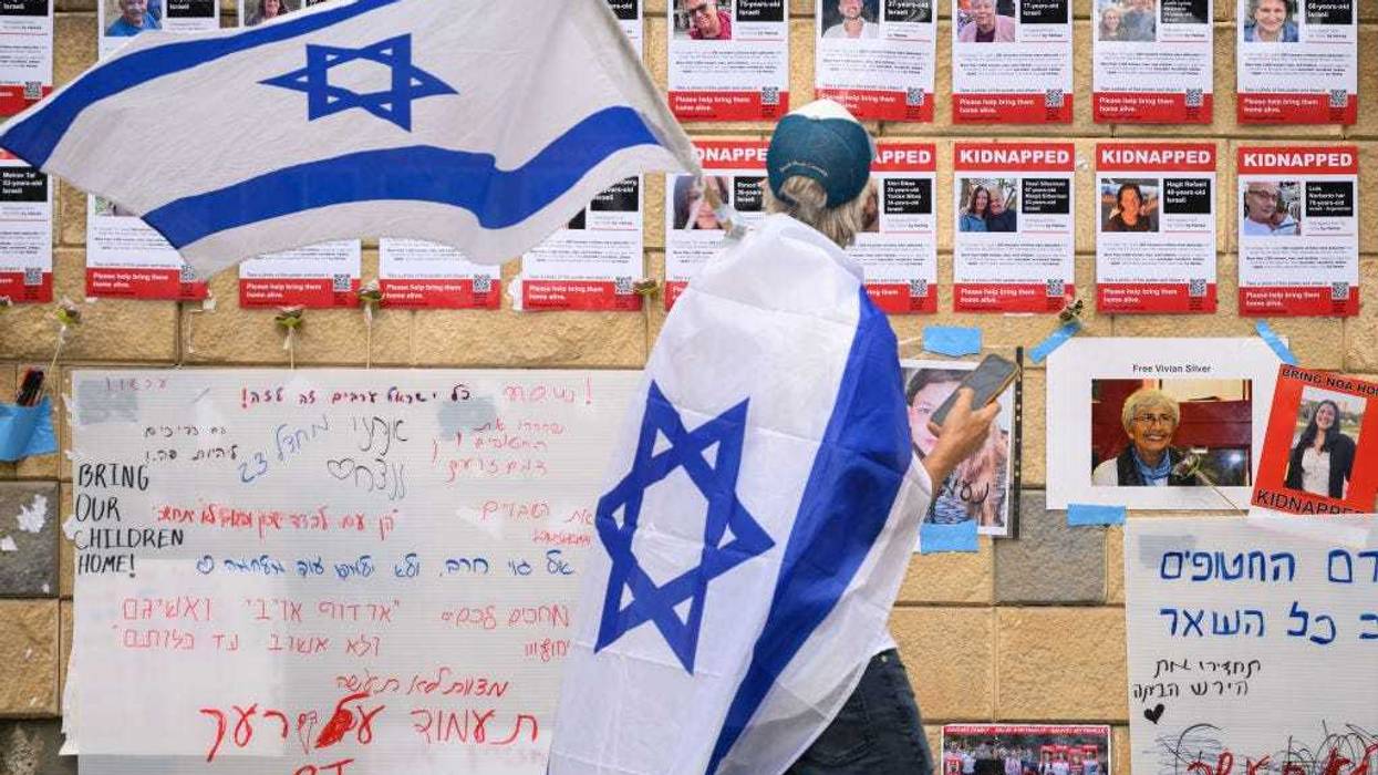 Photographs of the men, women, children and babies kidnapped by Hamas during its Oct. 7 terror attack in souther Israel, in Tel Aviv.