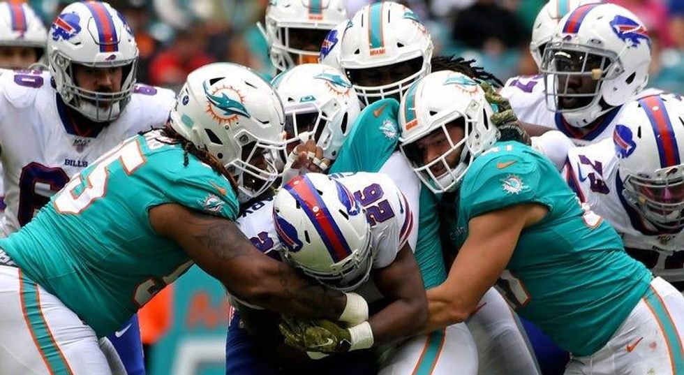 PHOTOS: Bills Sink Dolphins 37-20