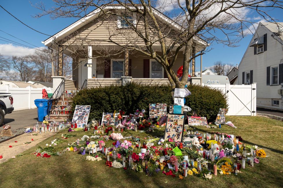 Photos from the memorial at the home of the Nierodas, where Linden was rocked following a four-person murder-suicide.