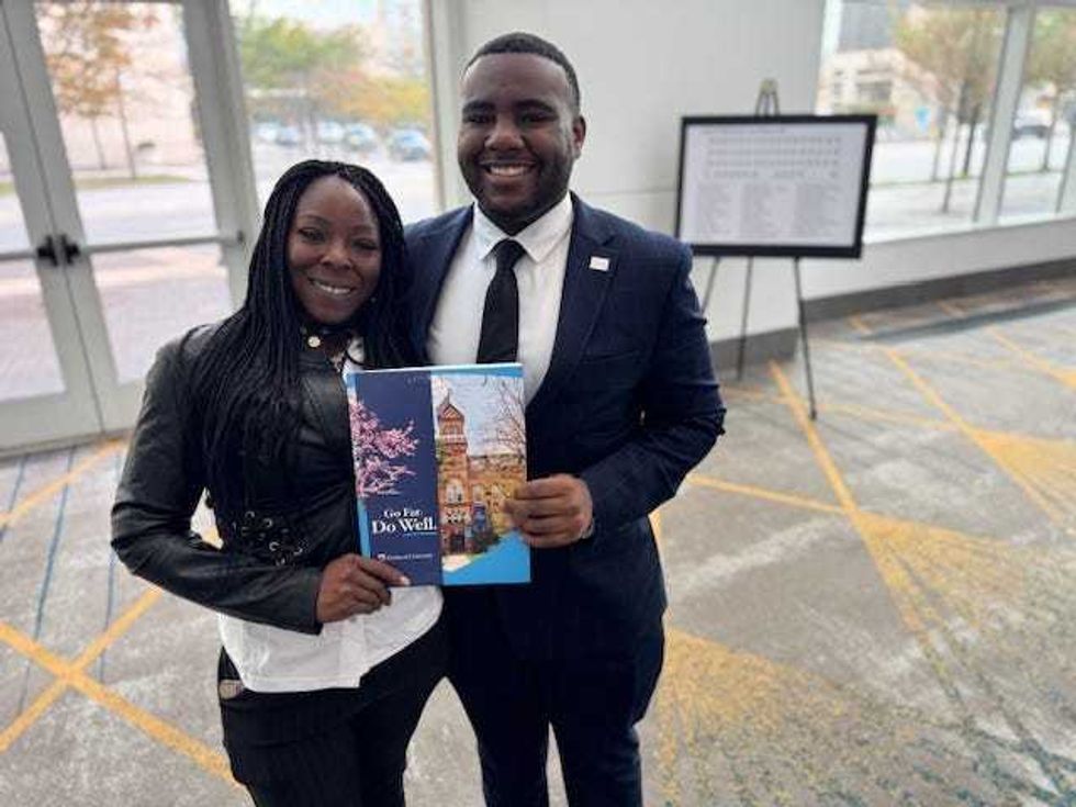 Phyllis Washington & son Jonathon Wilson celebrate his acceptance into college