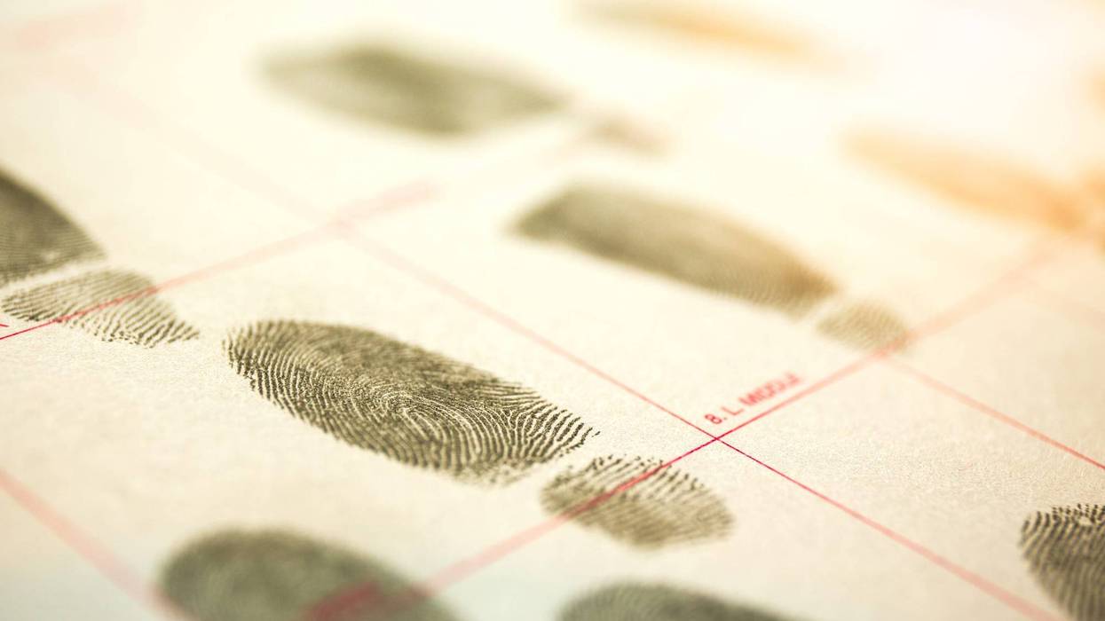 Physiological biometrics concept for criminal record by fingerprint in cinematic tone