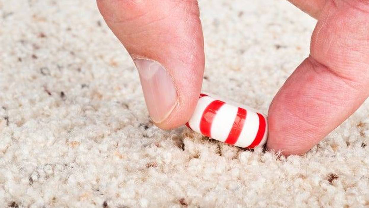 Picking Up Candy From Carpet