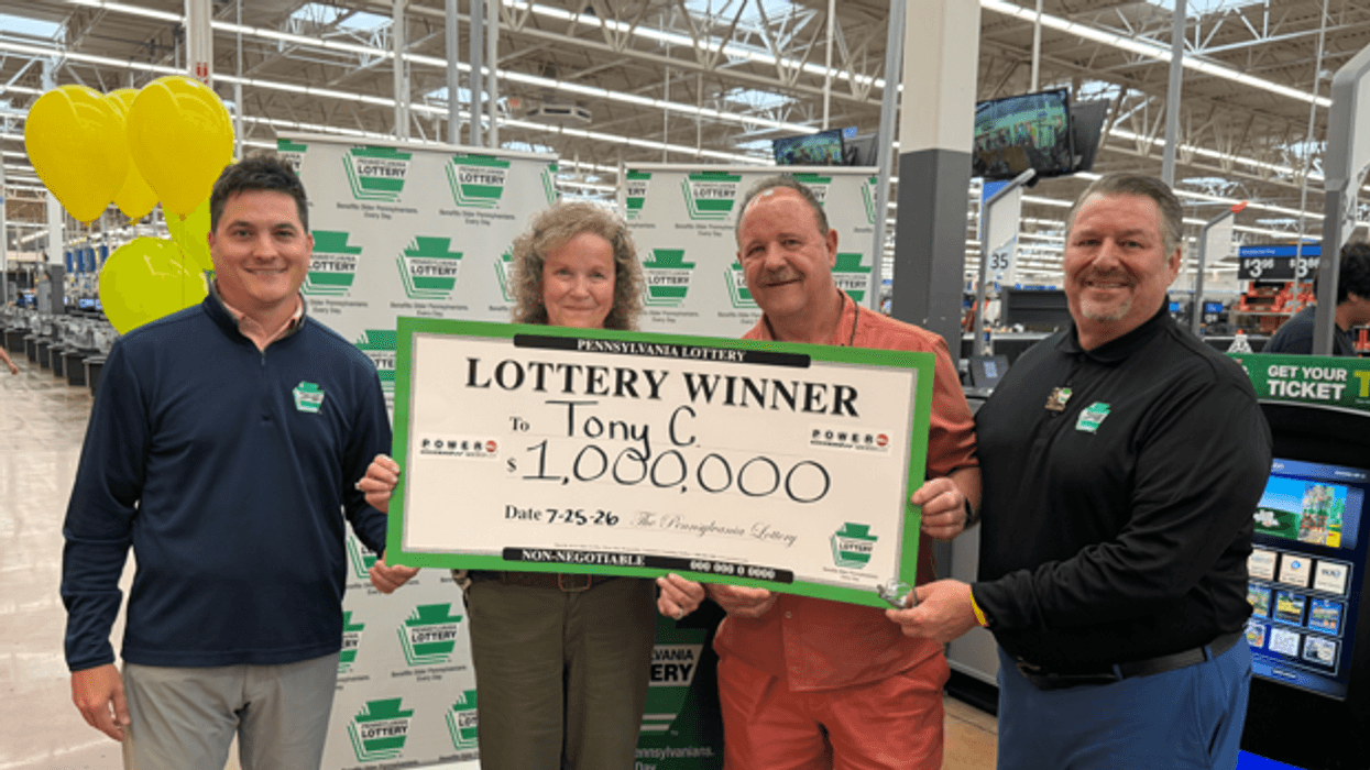 Pictured from left to right are PA Lottery Assistant Western Regional Sales Manager Allen Zieglar, Winners Tracey and Tony Corso, PA Lottery Deputy Executive Director of Sales & Retail Operations Eric Grubbs