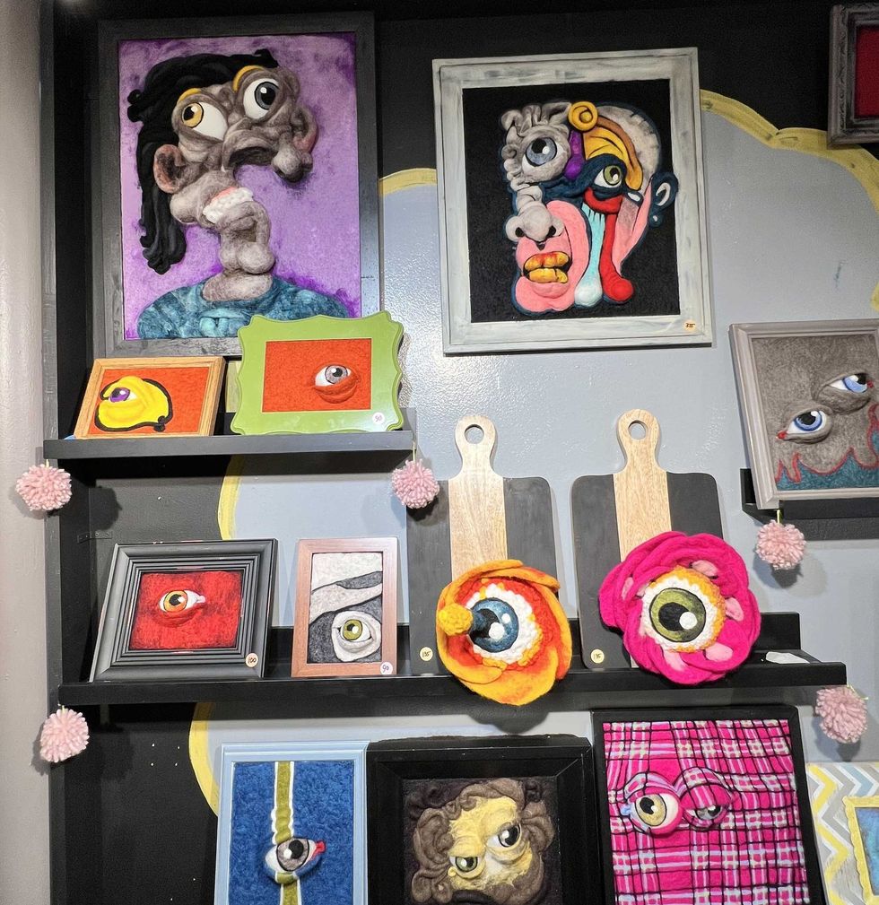 pieces of eye art at Andersonville Galleria