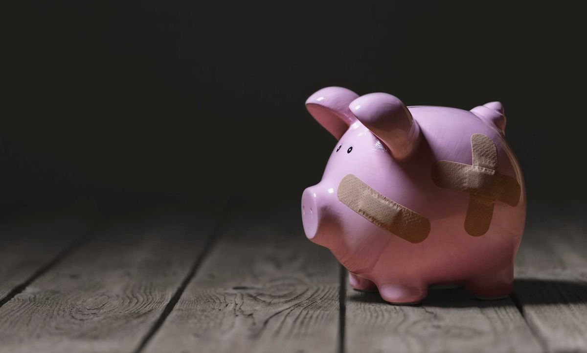 Piggy bank with bandaids.
