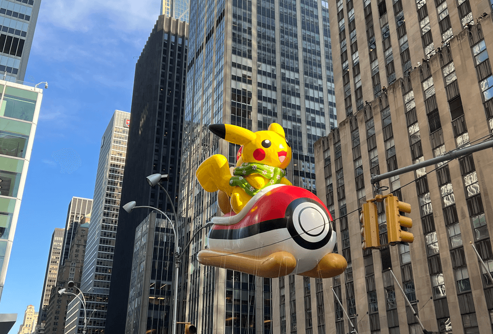 Pikachu riding a Pokémon themed sled