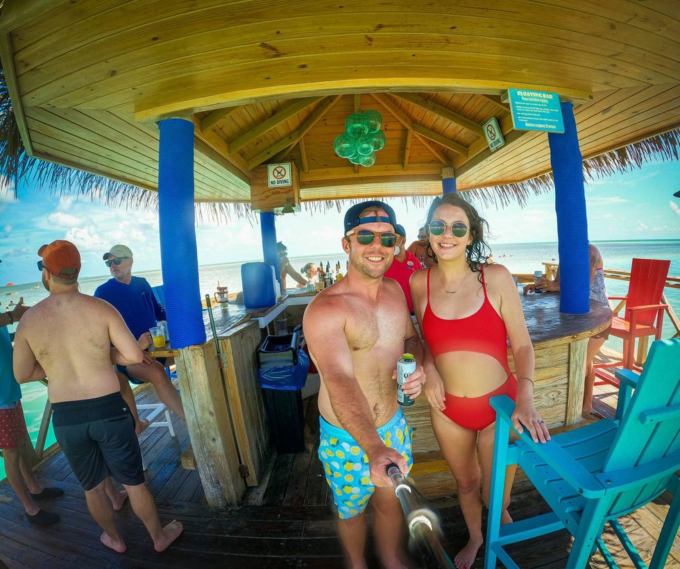 Pike and Lauryn on floating tiki bar