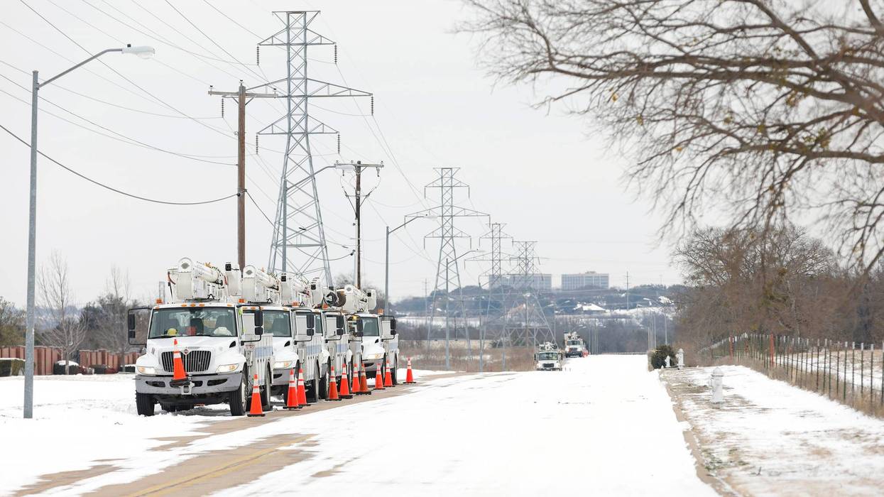 Pike Electric service trucks line up after a snowstorm on February 16, 2021, in Fort Worth, Texas.